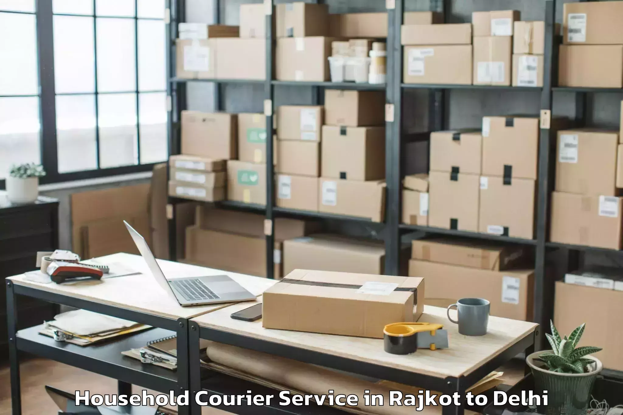 Trusted Rajkot to Chanakya Puri Household Courier